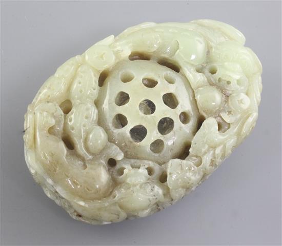 A Chinese celadon and brown jade carving, 20th century, 10cm